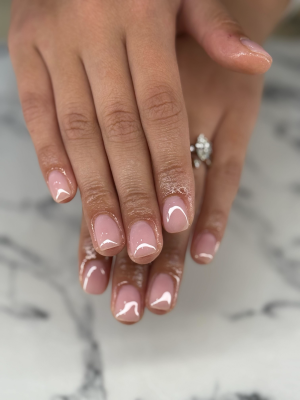 picture of hands with a gel polish manicure